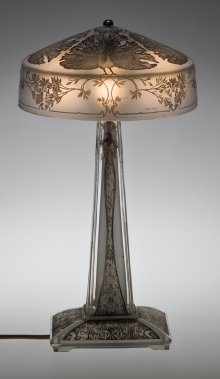 Table Lamp, Paons (Peacocks), designed 1910. Mold-pressed glass, acid-etched, applied patina; electric light fittings. H. 39.8 cm, Diam. 21.9 cm. (2011.3.210, gift of Elaine and Stanford Steppa)