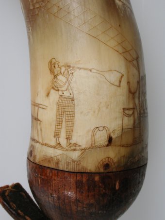 Fig. 3: Detail of powder horn showing figure of the glassblower.