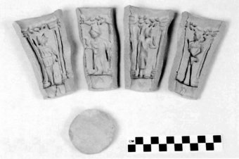 Fig. 5: Terra-cotta mold panels and disk made for the reproduction of a mythological beaker. (Photo: author)