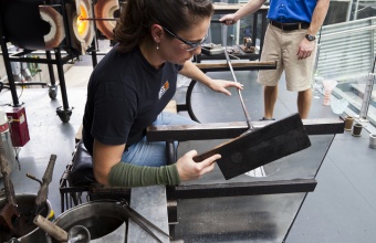 Gaffers Annette Sheppard and G Brian Juk work on a prototype by designer Jason Miller