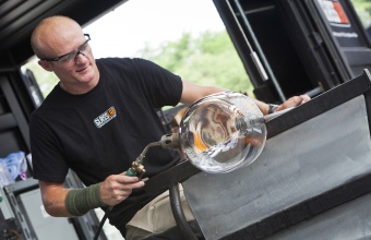 Glassmaker G Brian Juk works with designer Jon Otis at GlassLab in Corning, July 2012