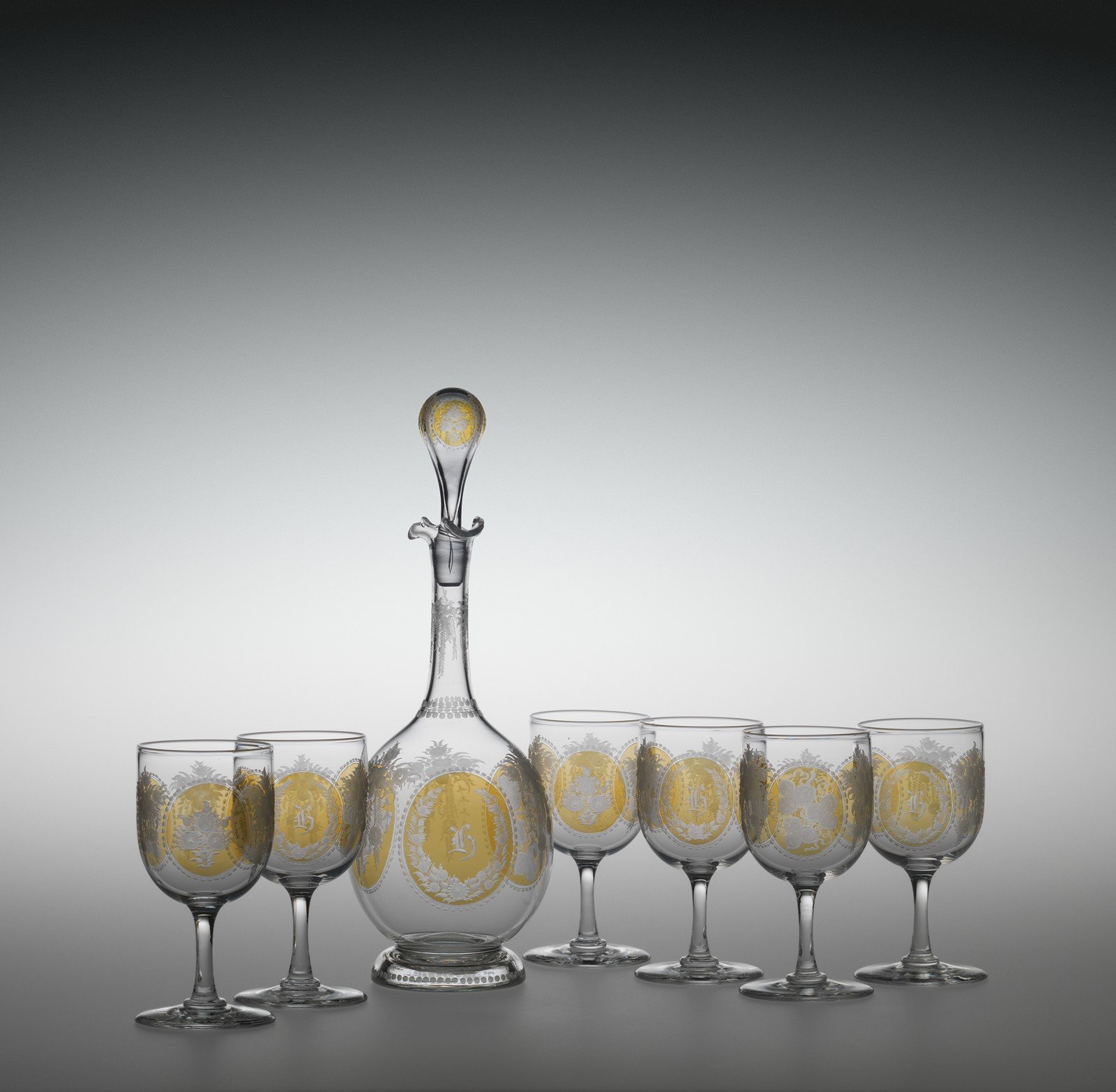 A collection of glass decanters, 19th century and a set of six wine